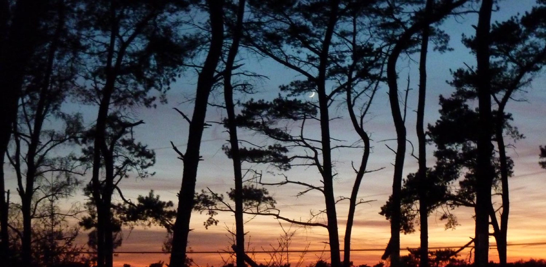 Zonsondergang boven het terrein van De Krösenberg
